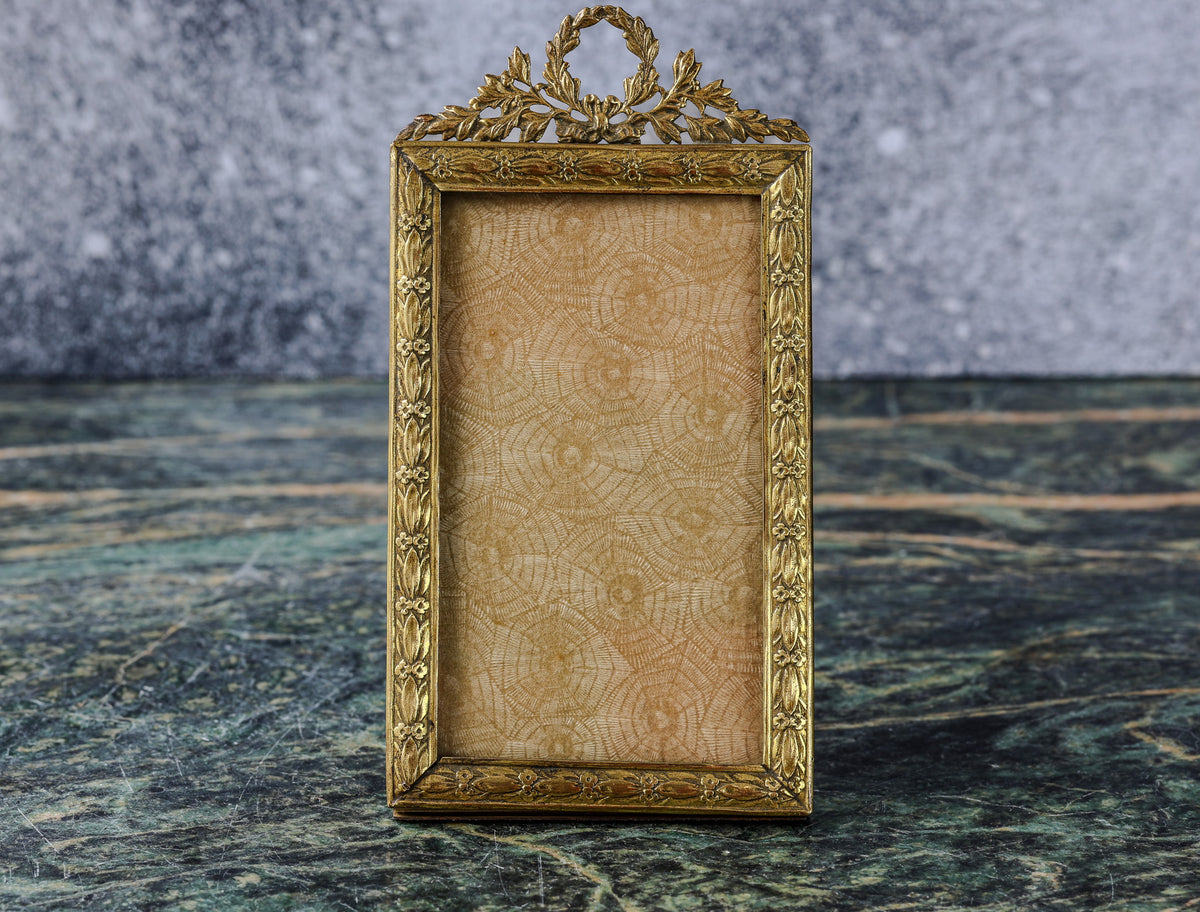 Antique Louis XVI Style Gilt Photo Frame | Laurel Wreath Crest, Laurel Leaf and Rosette Border, Easel Back
